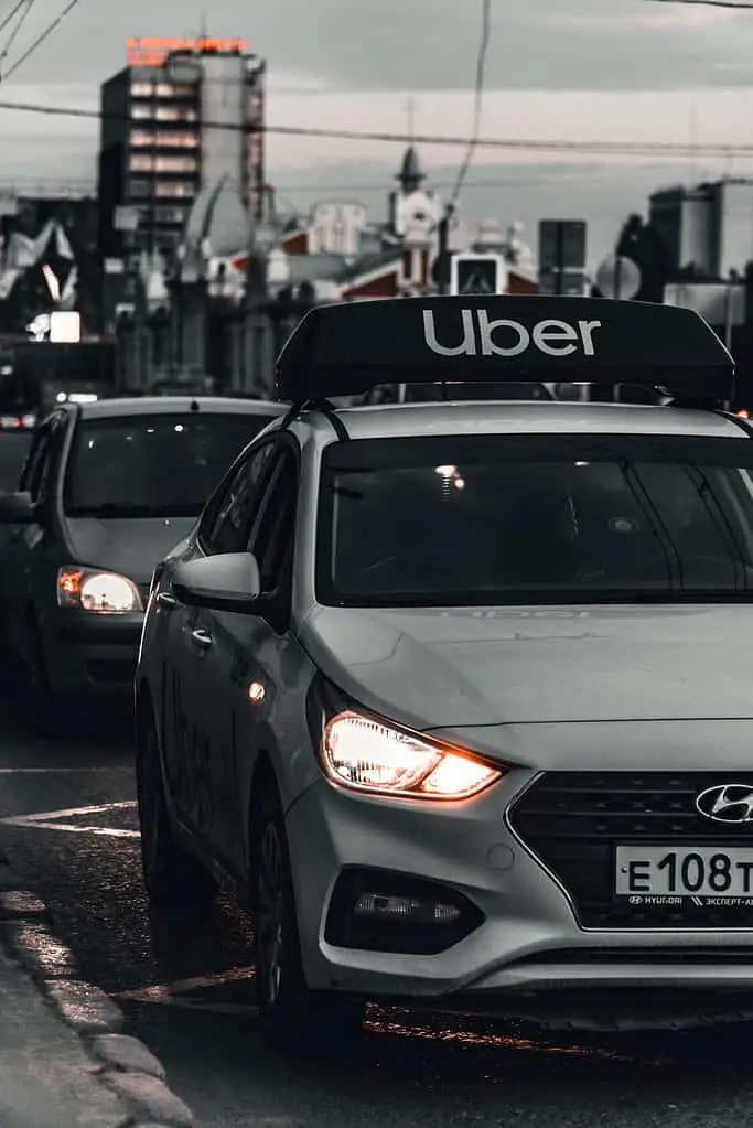 "Uber car waiting for passengers in the bustling streets of Mexico City."