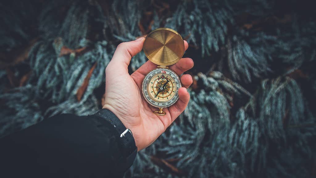 Discovering new cenotes man with a compass